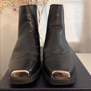 ASOS DESIGN cuban heel  chelsea boots in black faux leather with silver toe cap.